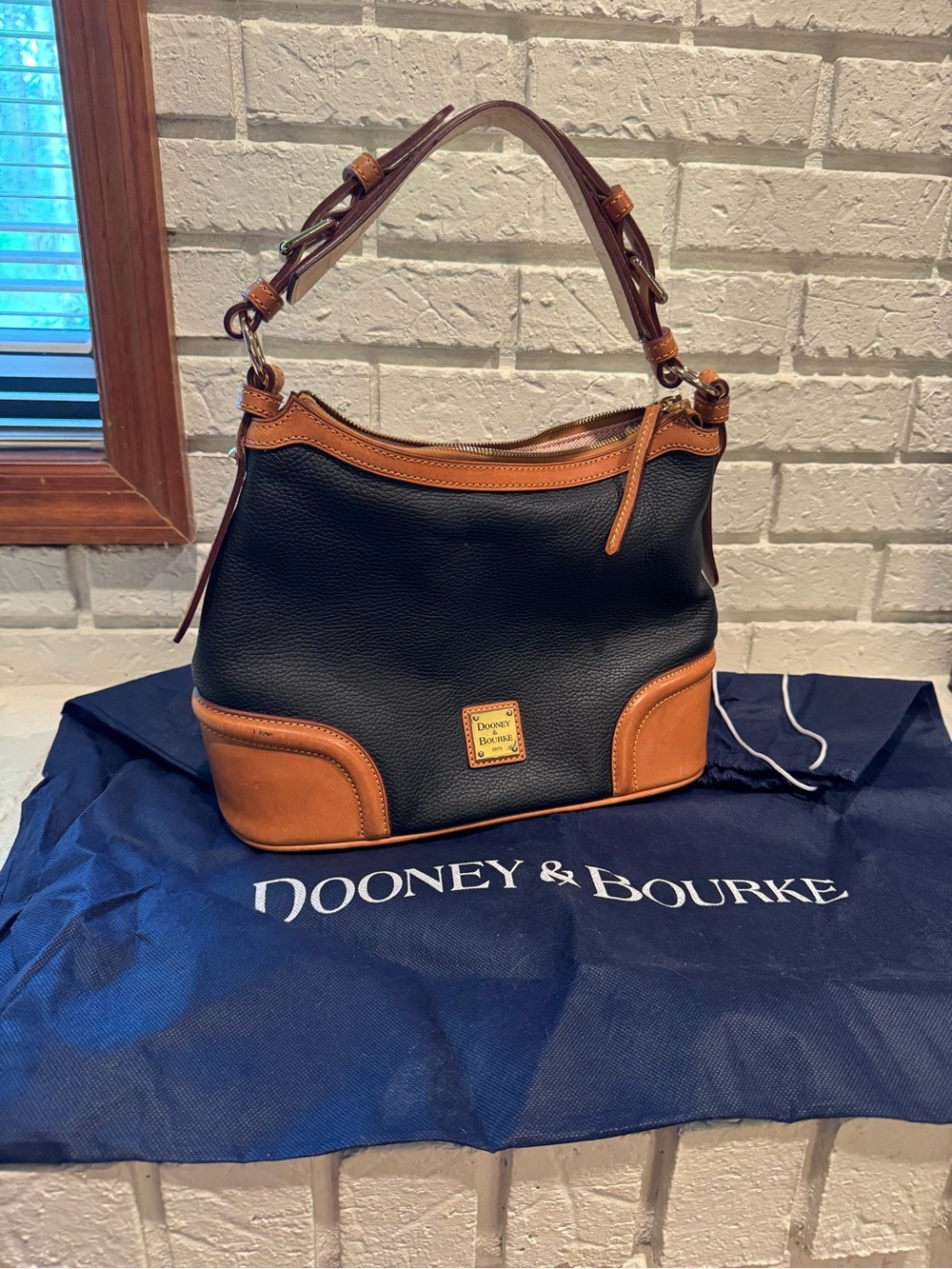 Dooney & Bourke Black with Brown Trim Pebble Leather Shoulder Bag